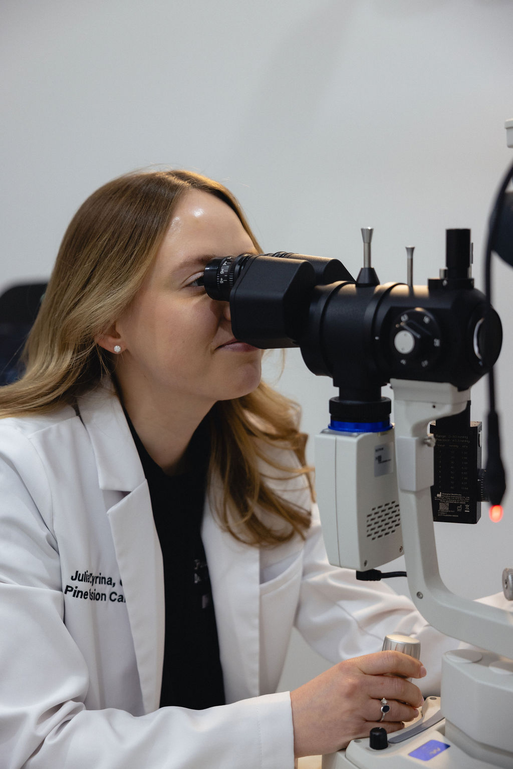 PVC doctor performing a precise slit-lamp eye examination.